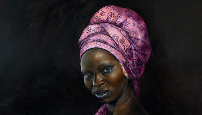 Painting of Woman with her hair wrapped up in a pink cloth